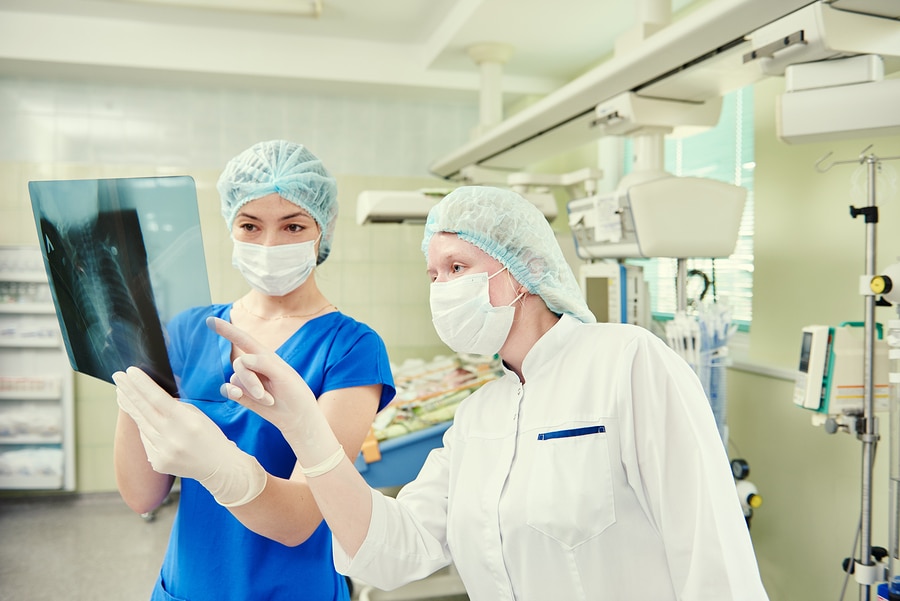 intensive care unit female doctor with xray image New Smyrna Beach